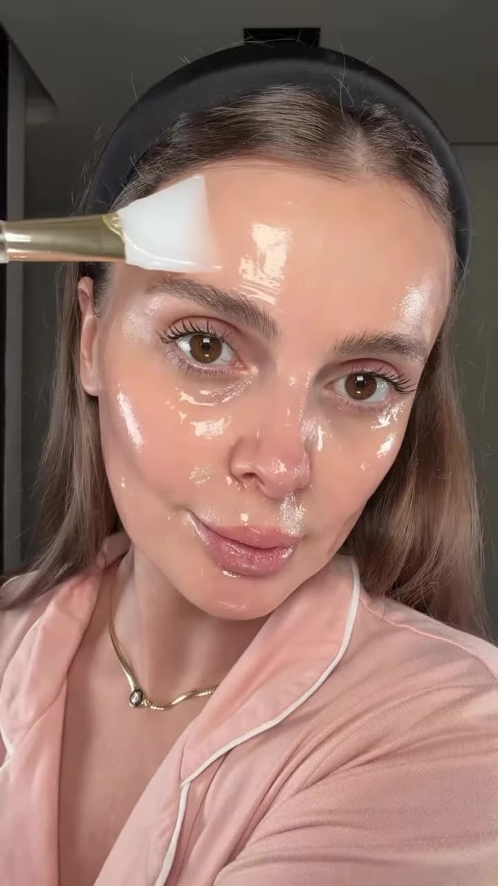 Albina Mavriqi applying a Medicube mask with a brush