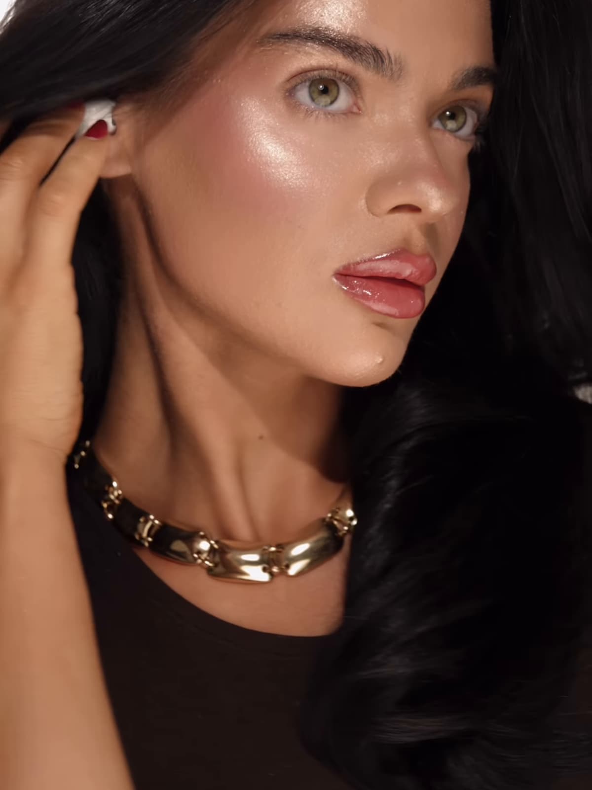 Dariia with a finished autumn makeup look in a close three-quarter portrait.